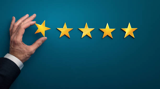 istock Hand of client giving a one star rating, bad experience 1199680245