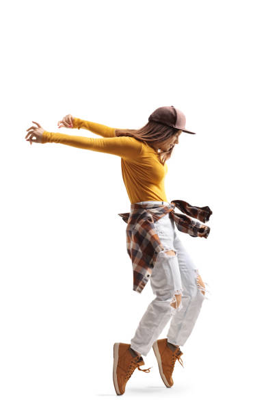 istock Young woman dancing on tiptoes 1199681236