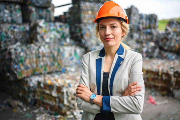 istock Confident Female Waste Management Expert Working Outdoors 1199683612