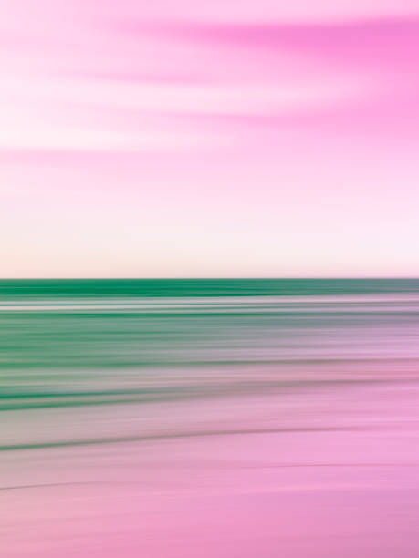 istock Ombre Pink to Green Coastal Scene Blurred Motion Background 1199683677
