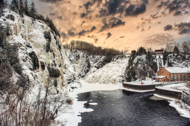 A sunset nice and Frozen waterfall in quebec country