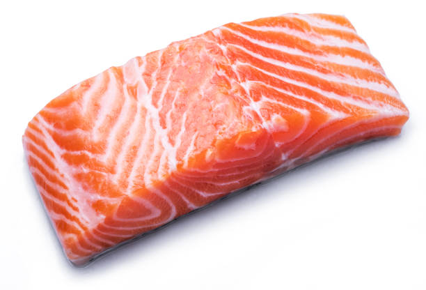 istock Fresh raw salmon fillet on white background. 1199685870