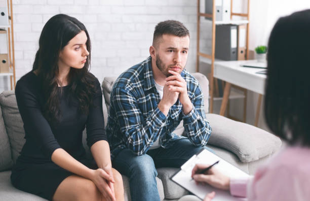 istock Man talking to psychotherapist during marital therapy session 1199686047
