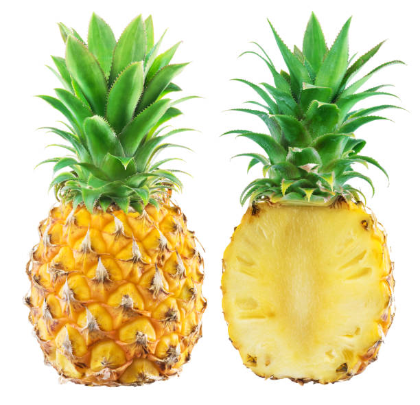 istock Whole pineapple and half of pineapple isolated on white background. 1199686646