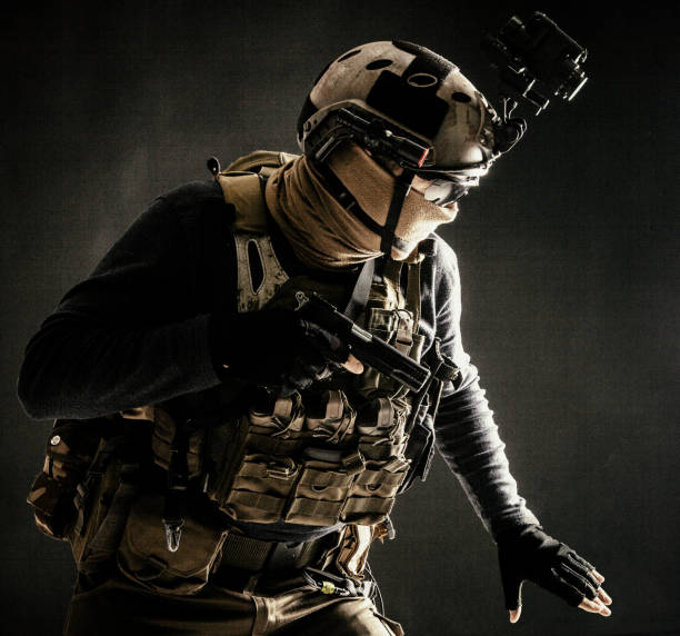 istock Army infantryman moving in darkness with caution 1199687251