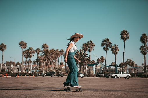 profi skater on a parking spot at santa monica. california lifestyle