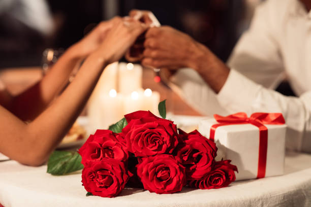 istock Loving Spouses Holding Hands Celebrating Valentine's Day In Restaurant. Cropped 1199689447