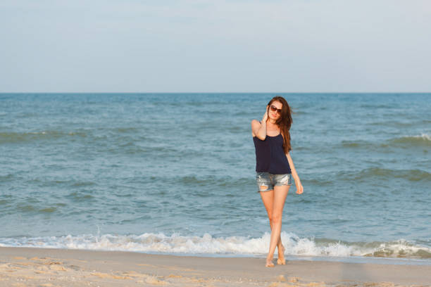 Young woman by the sea.