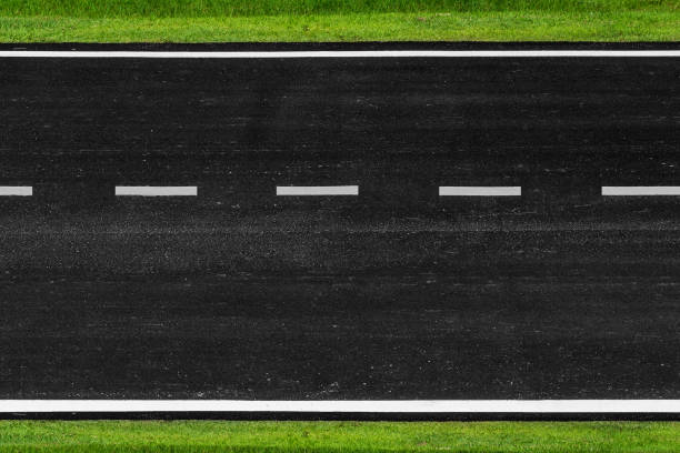 istock Asphalt road with marking lines white stripes texture Background 1199690809