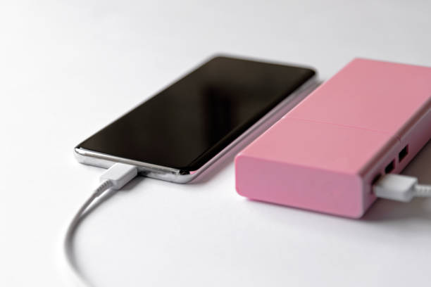 istock Smart phone power charging via power bank 1199692825