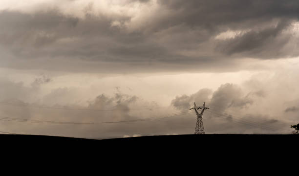 istock Rural landscape in summer afternoon with overcast and cloudy sky 1199694513