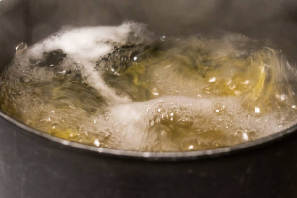 istock A pot of boiling spaghetti noodles. 1199697512