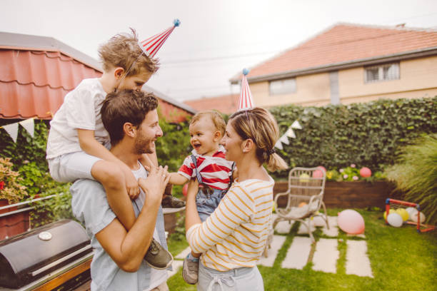 istock Happy family in their yard 1199699441