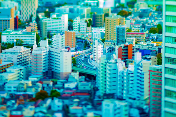 A highway at the urban city in Tokyo tiltshift A highway at the urban city tiltshift. Toshima district Ikebukuro Tokyo / Japan - 11.20.2019 diorama photos stock pictures, royalty-free photos & images