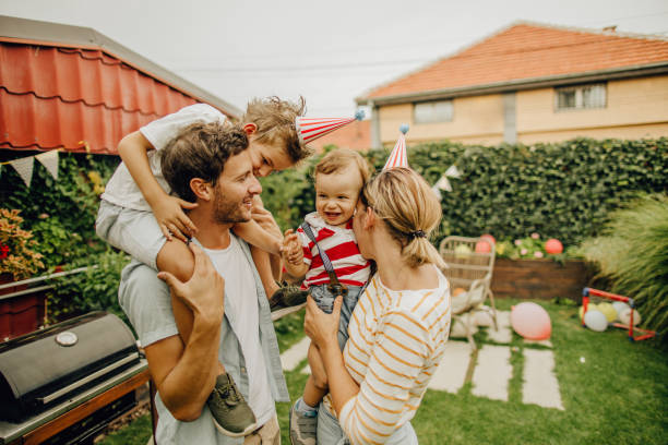istock Happy family in their yard 1199700973