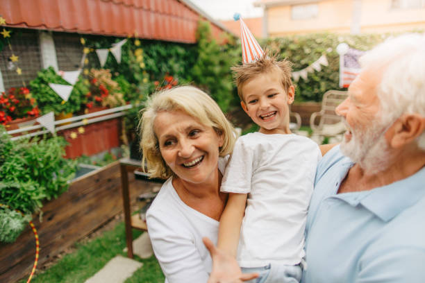 istock Smiling senior couple and their grandson 1199703009