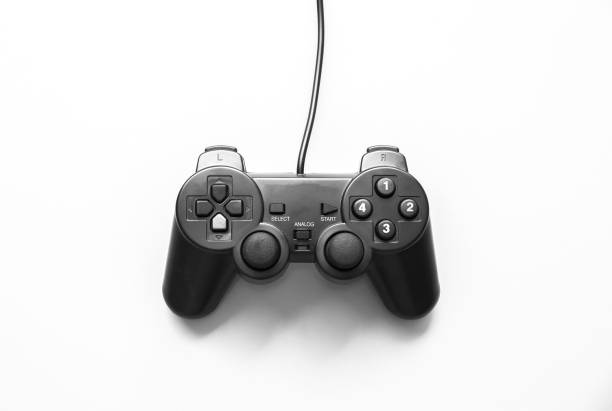 istock Joystick lying on the white background. Gamepad for playing computer games. 1199703641