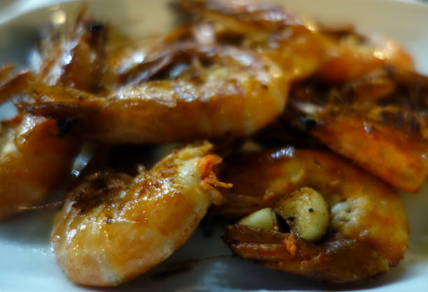 istock grilled tasty shrimps close-up with blur effect. 1199704649