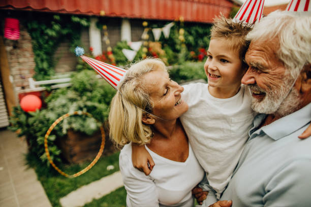istock Smiling senior couple and their grandson 1199705998
