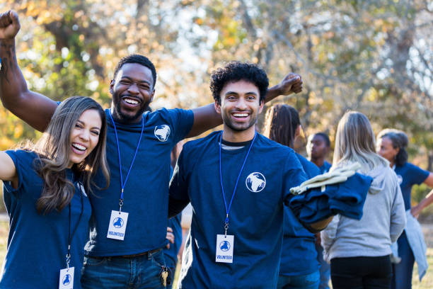 Three friends participate in cleanup event