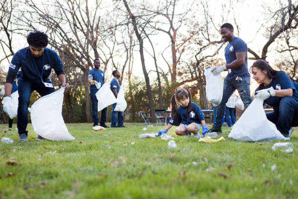istock Neighbors working together to clean up their community 1199706309