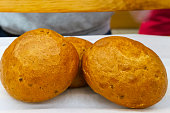 Hamburger bread muffins on white table.