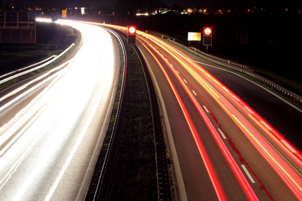 istock Long exposure of car lights on a freeway 1199709641