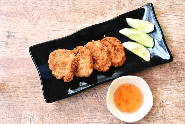 istock deep fried mashed shrimp with breadcrumbs Thai pancake dipping with sweet sauce 1199710237
