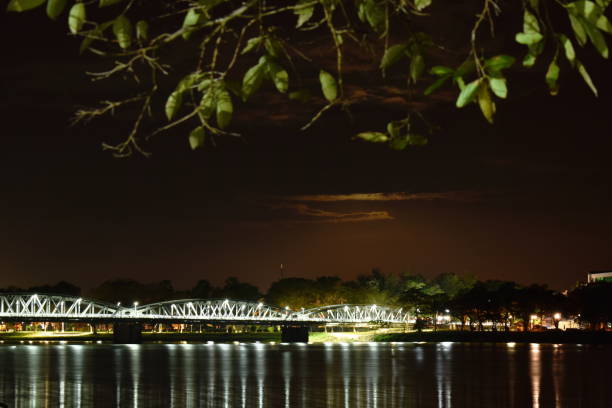 istock bridge cross river and reflection light bulb in Vietnam 1199710300