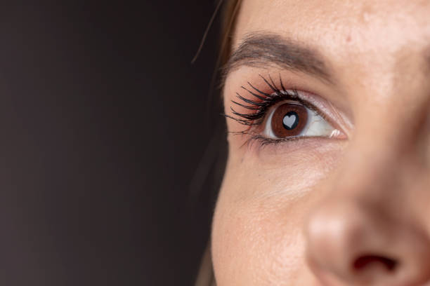 istock Female eye macro shot on iris is visible heart shape 1199713200