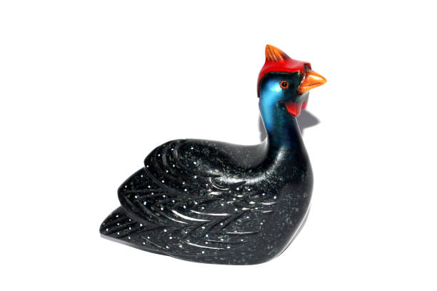 A Wooden Decorative Hen Bird Sitting on a White Background