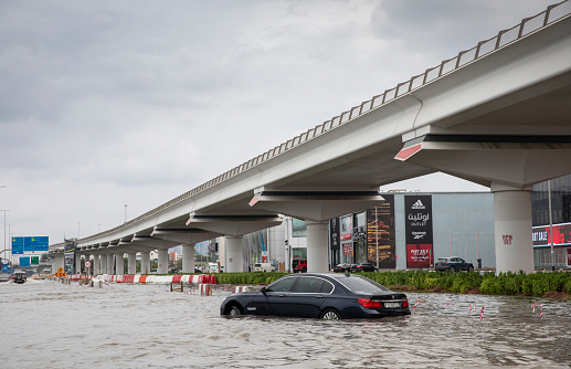 Dubai, United Arab Emirates, 11th January 2020: cars driving in a flooded motorway in Dubai after unusually heavy downpour
