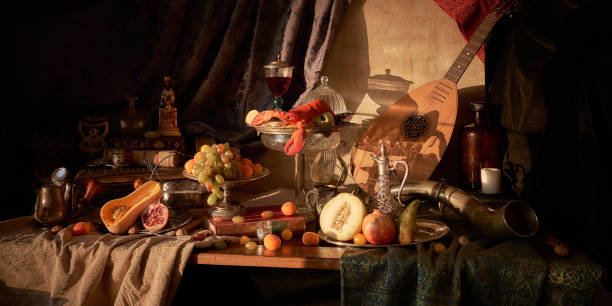 Classic still life with lobster 27/5000
Photography like an oil painting in the Dutch old masters style with lobster, fruits on a silver, platter, silver carafe. old books, glass of wine, hunting horn and guitar lute . medieval stock pictures, royalty-free photos & images
