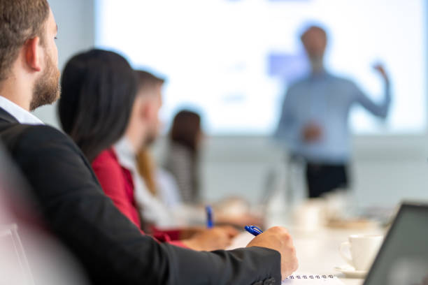 istock Man listening to a business presentation 1199718499