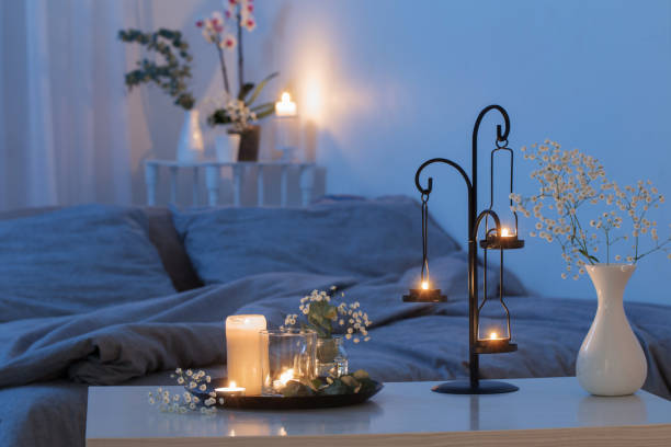 istock antique candlestick with burning candles in bedroom 1199718640