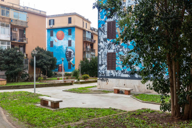 Bologna, Italy - July 31, 2022: Graffiti painted on buildings near Bologna Municipal Theater at the intersection of Largo Respighi and Via del Guasto