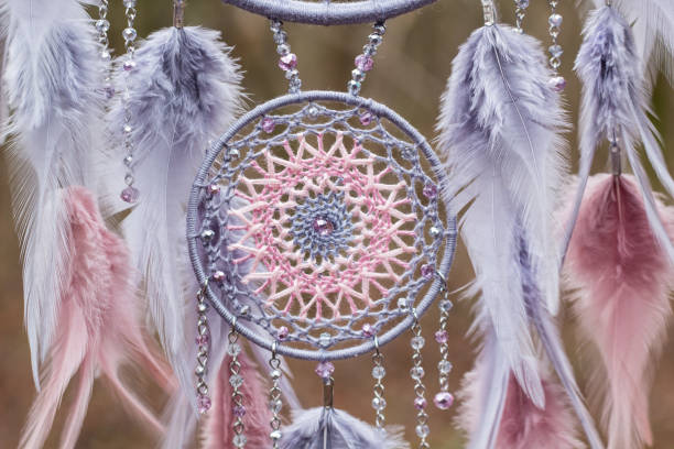 Handmade dream catcher with feathers threads and beads rope hanging Dream catcher with feathers threads and beads rope hanging. Dreamcatcher handmade dreamcatcher-circle-indigenous-culture-bead stock pictures, royalty-free photos & images