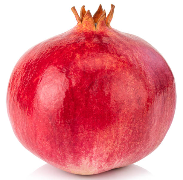 istock pomegranate isolated on white background with Clipping Path 1199719420