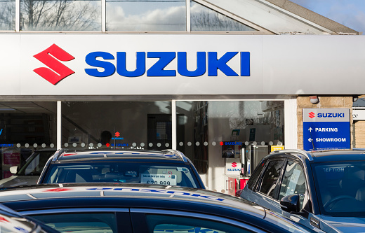 OXFORD, UK - January 03, 2020. Suzuki cars on a showroom forecourt outside a dealership in Oxfordshire, UK