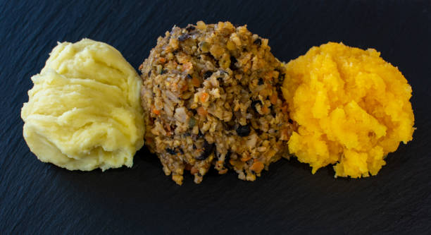 Vegetarian Haggis with Neeps and Tatties A meat free alternative for a Burns Supper haggis stock pictures, royalty-free photos & images