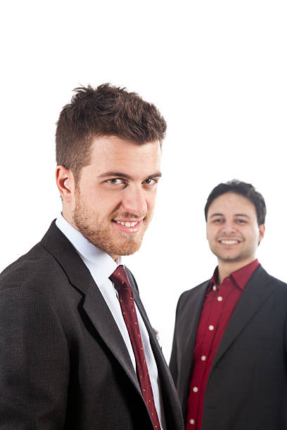 istock Two young confident businessman isolated on white 119972229