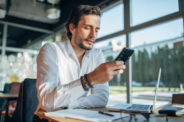 istock Businessman working in cafe 1199728627