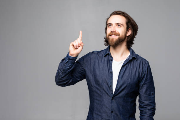istock Happy man has an idea portrait isolated on white background 1199730661