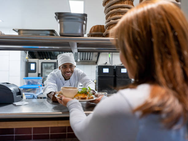 istock Plate coming out of the kitchen at a restaurant 1199731362