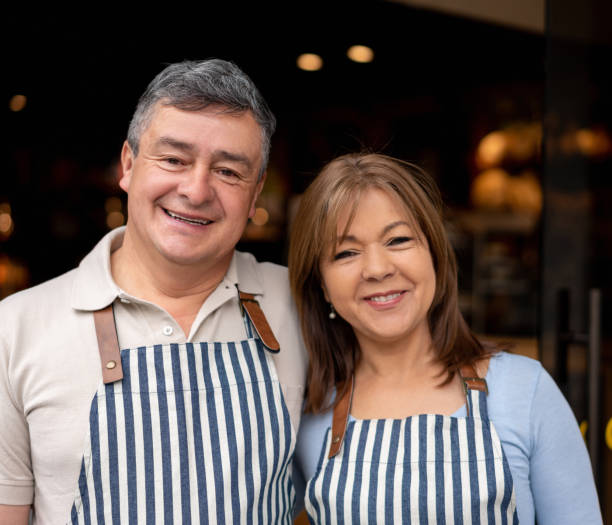 istock Team of waiters working at a bakery shop 1199731413