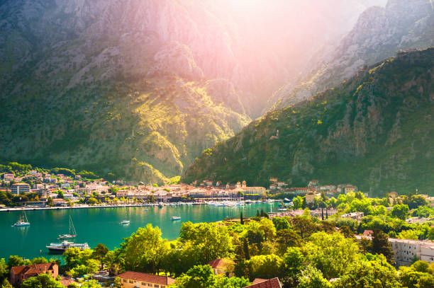 Panoramic view of Kotor town in Montenegro Panoramic view of Kotor town and Kotor bay in Montenegro at sunrise. Summer landscape. Famous travel destination. montenegro stock pictures, royalty-free photos & images