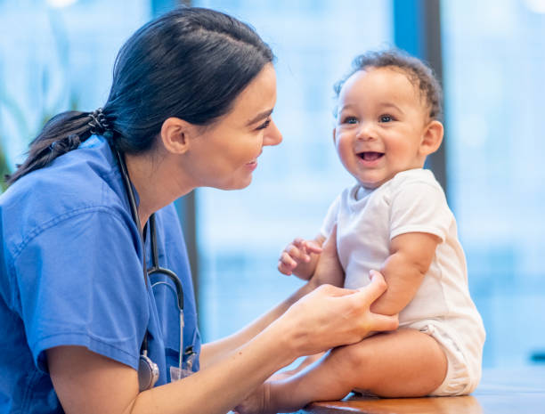istock Nurse Practitioner Checking out a Young Baby stock photo 1199735091