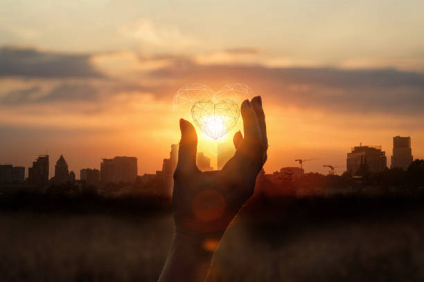 istock Hand supports the heart . 1199735400