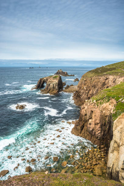 Enys Dodnan and the Armed Knight rock formations at Lands End, Cornwall, England, United Kingdom, Europe.