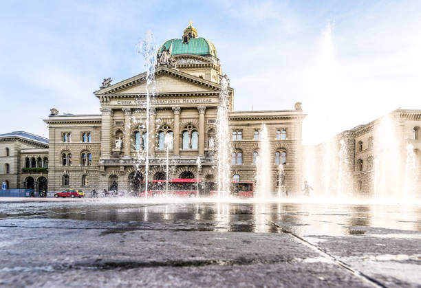 Federal House in Bern with fountain, Switzerland Fountain and the Federal Palace, Parliament Building in Bern, Switzerland bern photos stock pictures, royalty-free photos & images